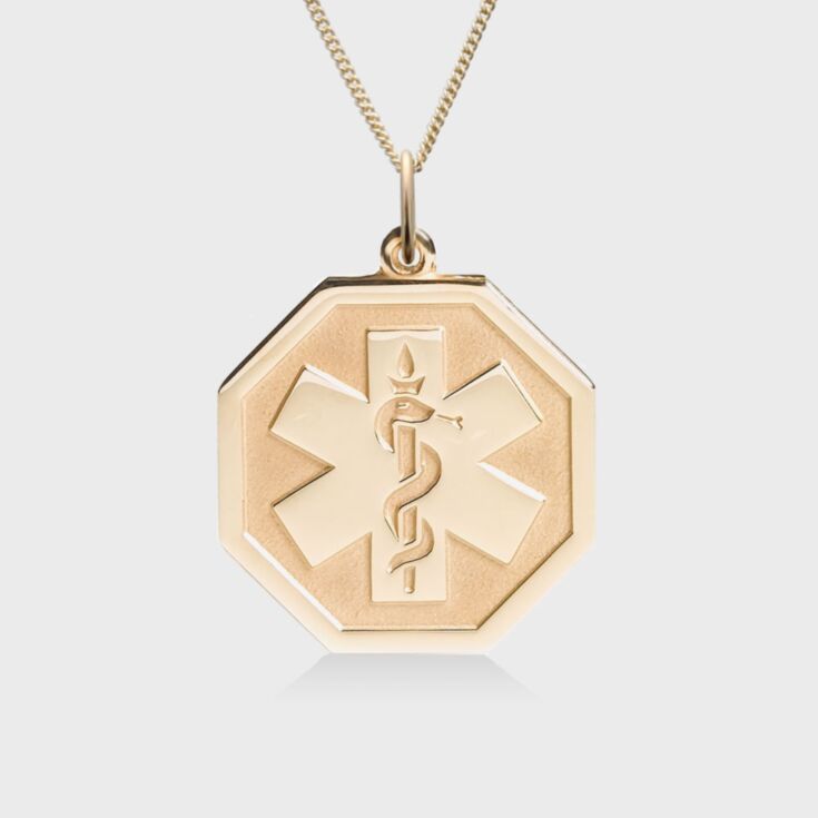 gold octagon shape medical id pendant, embossed with emblem 