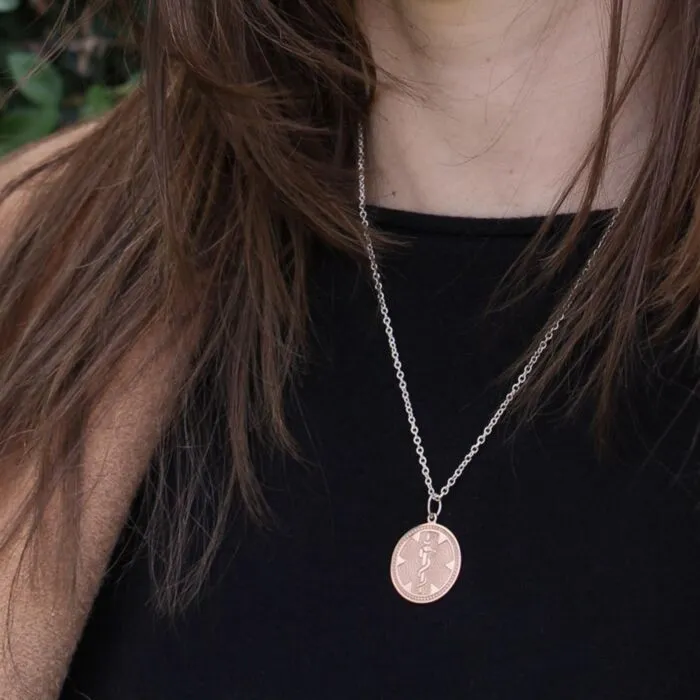 Rose gold medallion hotsell pendant